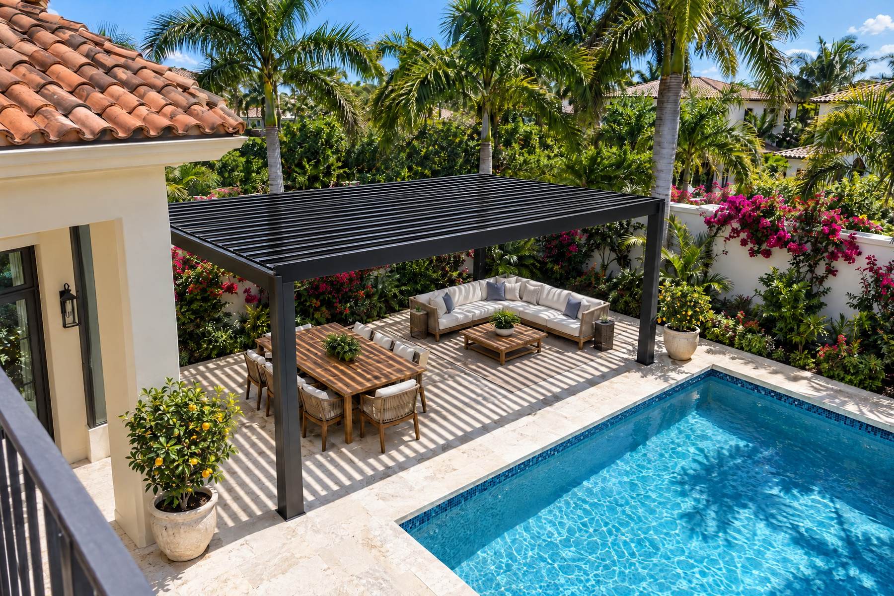 The same backyard with a plain black aluminum slatted pergola casting striped shade over the outdoor dining area